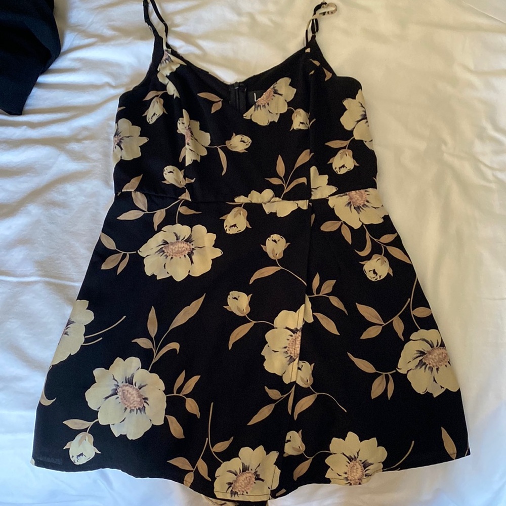 Lulus romper with skirt flap in front and adjustable straps